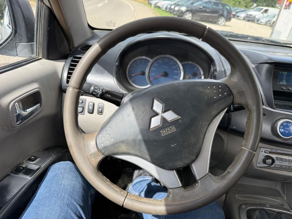 Mitsubishi L200 2006 — photo 8