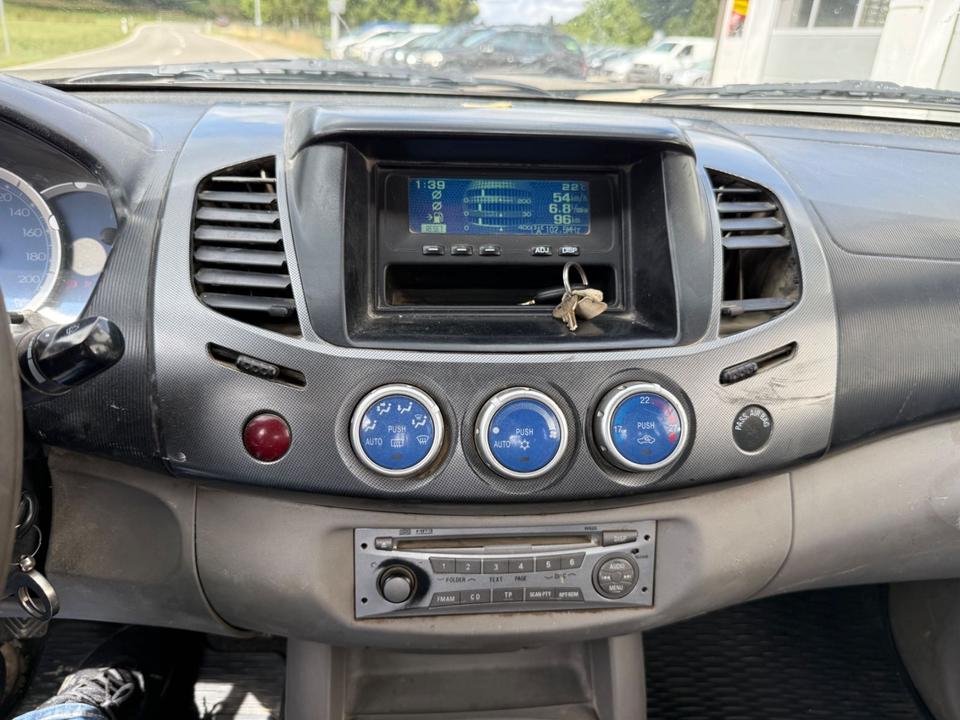 Mitsubishi L200 2006 — photo 9