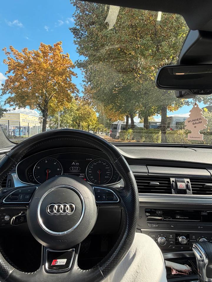 Audi A6 2011 — photo 13