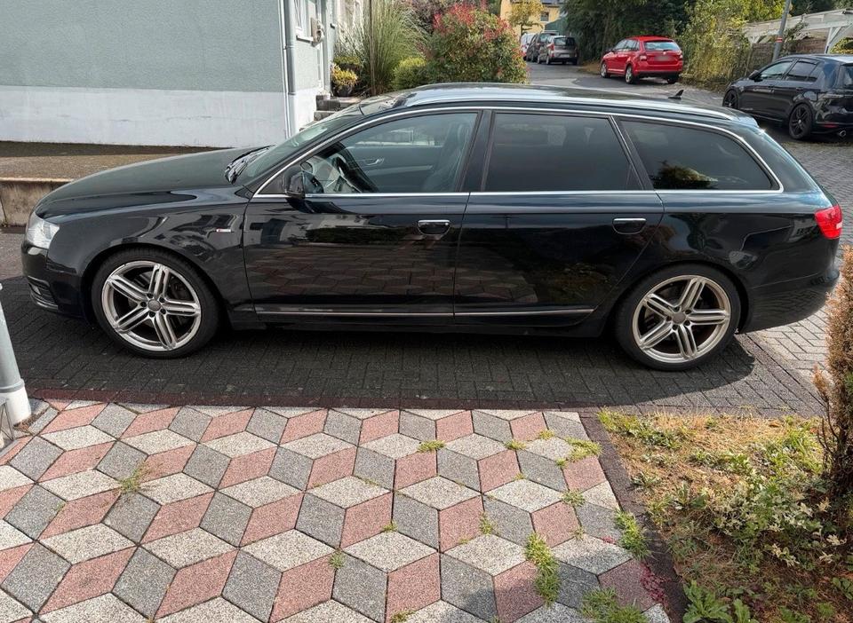 Audi A6 2010 — вигляд ззаду