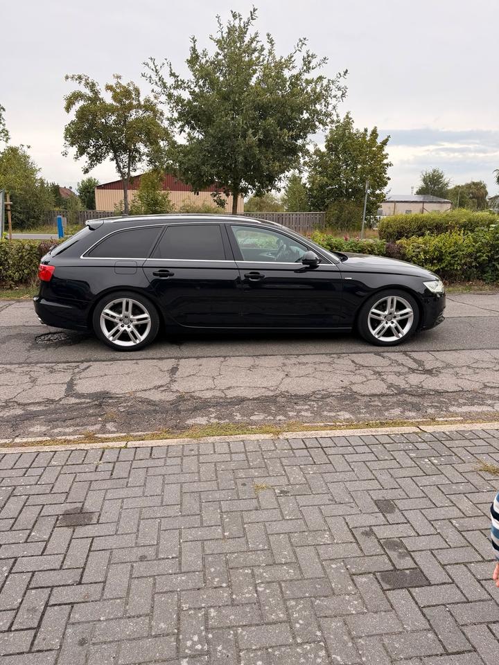 Audi A6 2011 — вигляд ззаду
