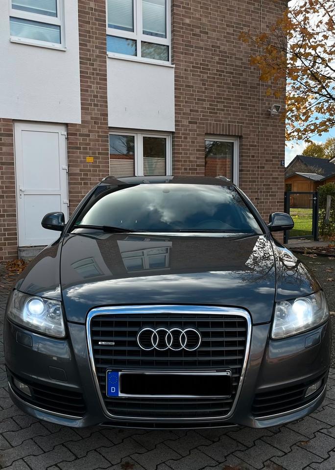 Audi A6 2010 — вигляд ззаду