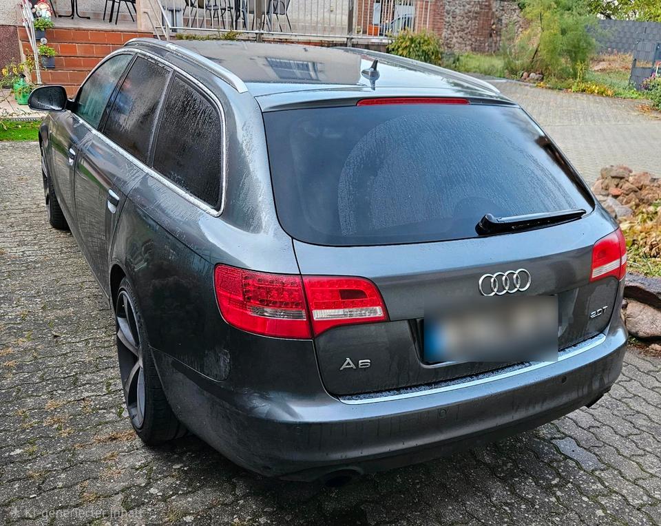 Audi A6 2010 — салон