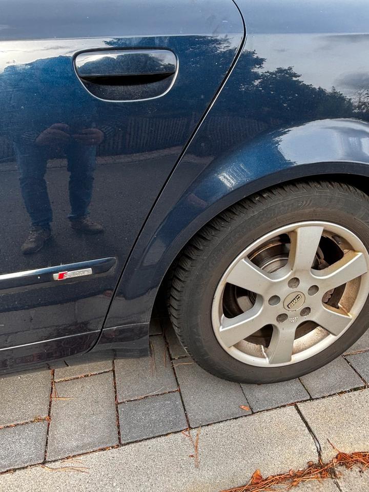 Audi A4 2004 — photo 12
