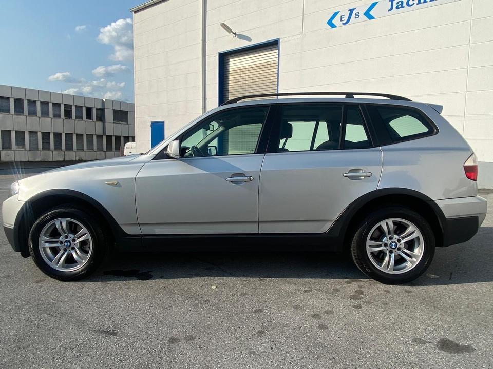 BMW X3 2009 — rear view