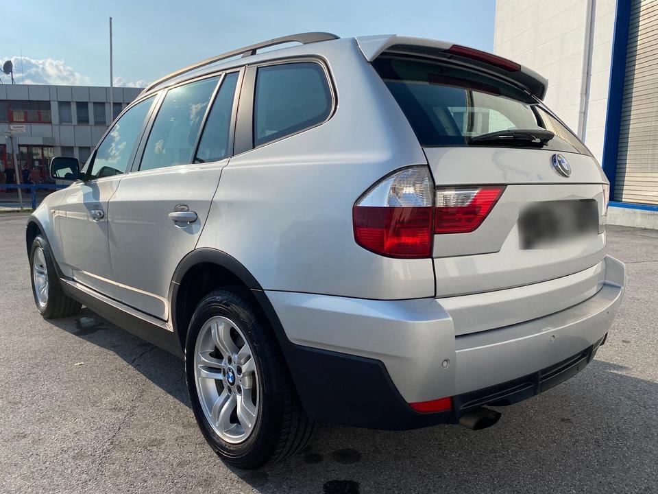 BMW X3 2009 — interior