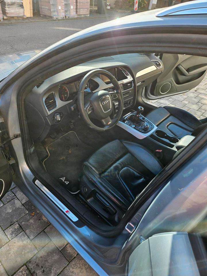 Audi A4 2009 — photo 7