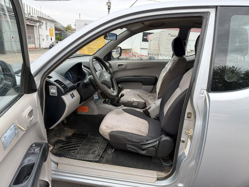 Mitsubishi L200 2006 — photo 12