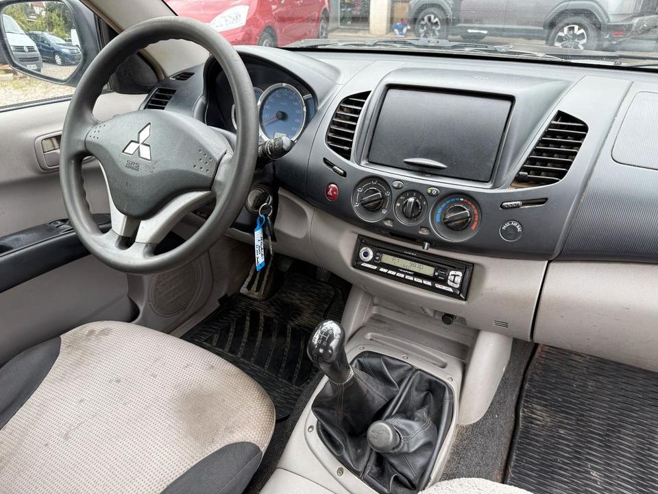 Mitsubishi L200 2006 — photo 13