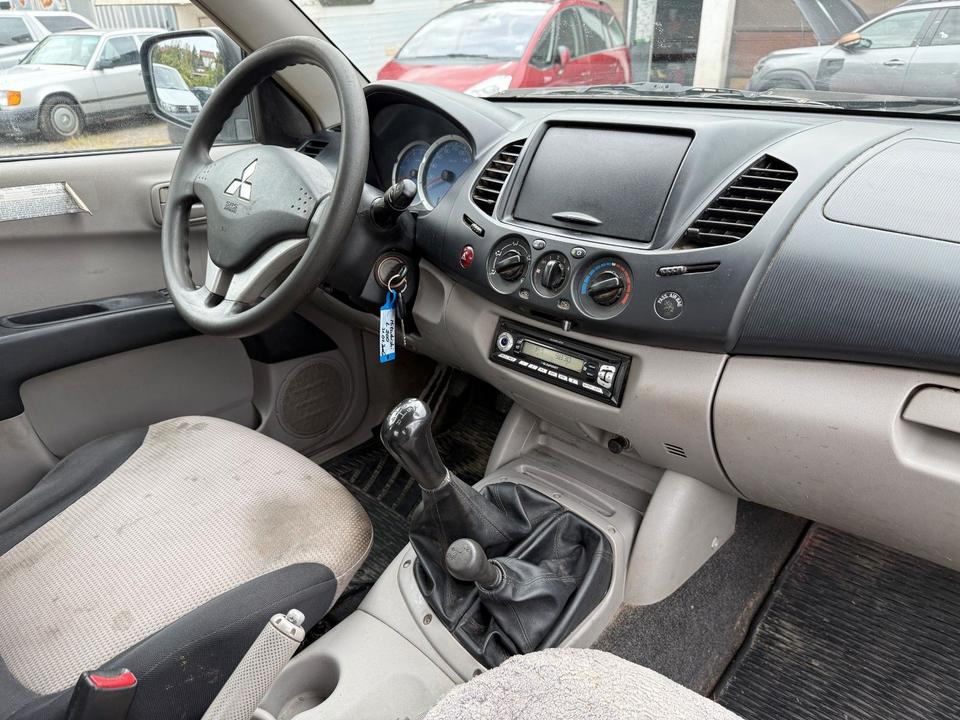 Mitsubishi L200 2006 — photo 15