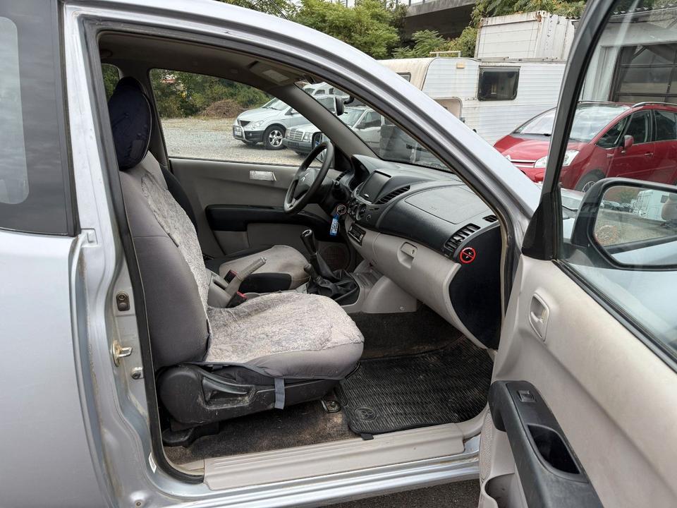 Mitsubishi L200 2006 — photo 20