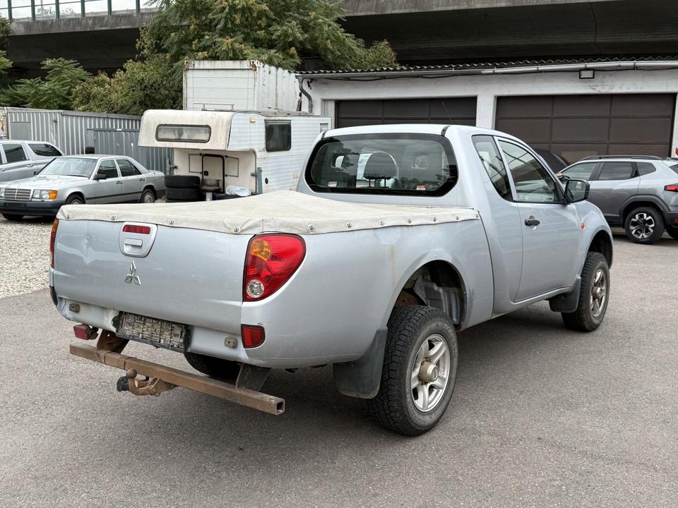 Mitsubishi L200 2006 — photo 6