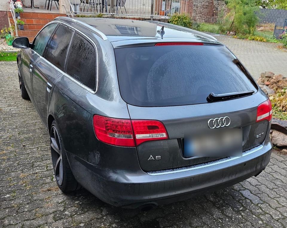 Audi A6 2010 — салон