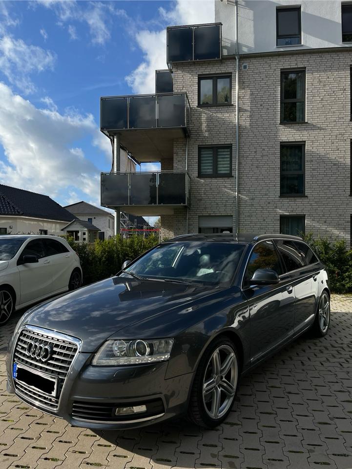 Audi A6 2010 — вигляд ззаду