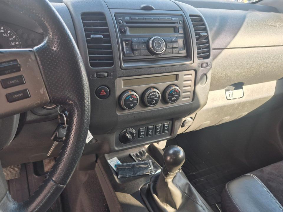 Nissan Navara 2009 — photo 13