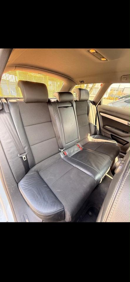 Audi A6 2010 — photo 11