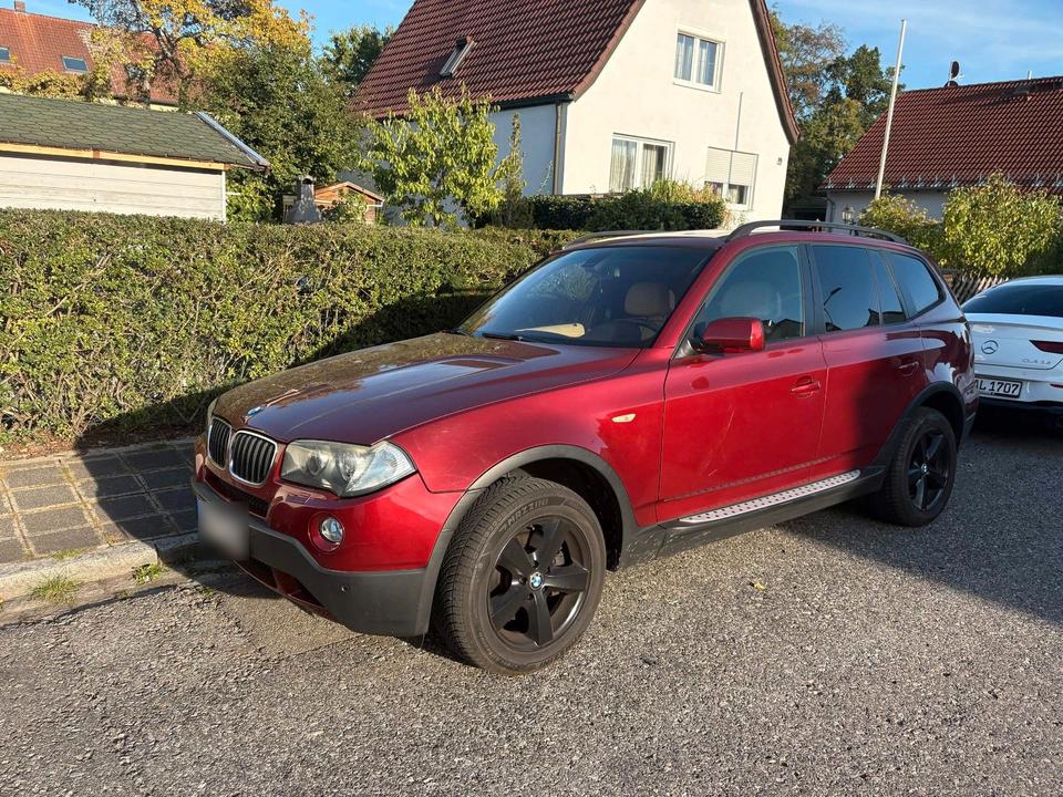 BMW X3 2009 — rear view
