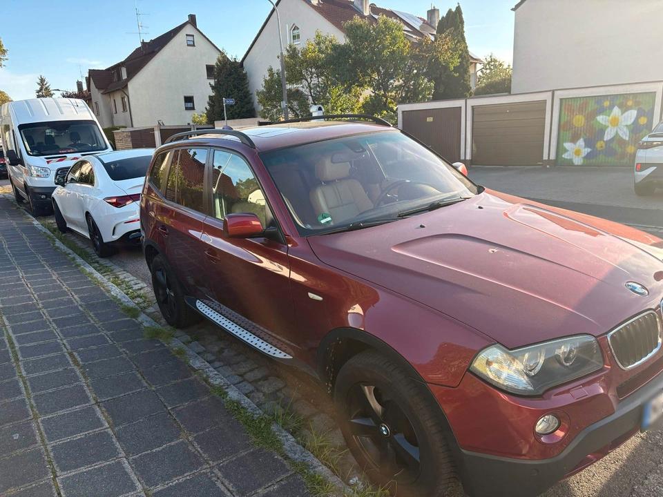 BMW X3 2009 — interior
