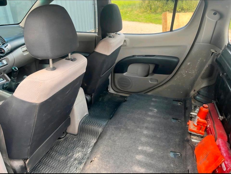Mitsubishi L200 2006 — photo 7