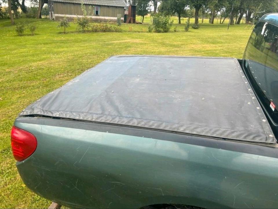 Mitsubishi L200 2006 — photo 9