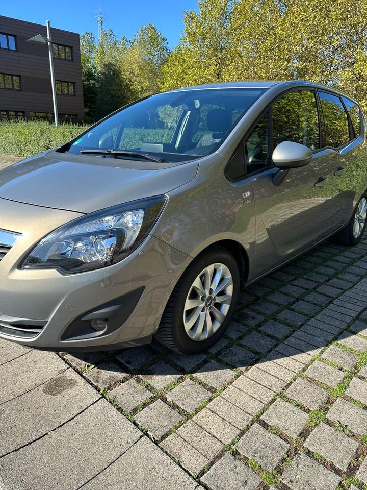 Opel Meriva 2013 — photo 20