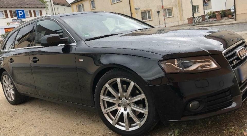Audi A4 2011 — салон
