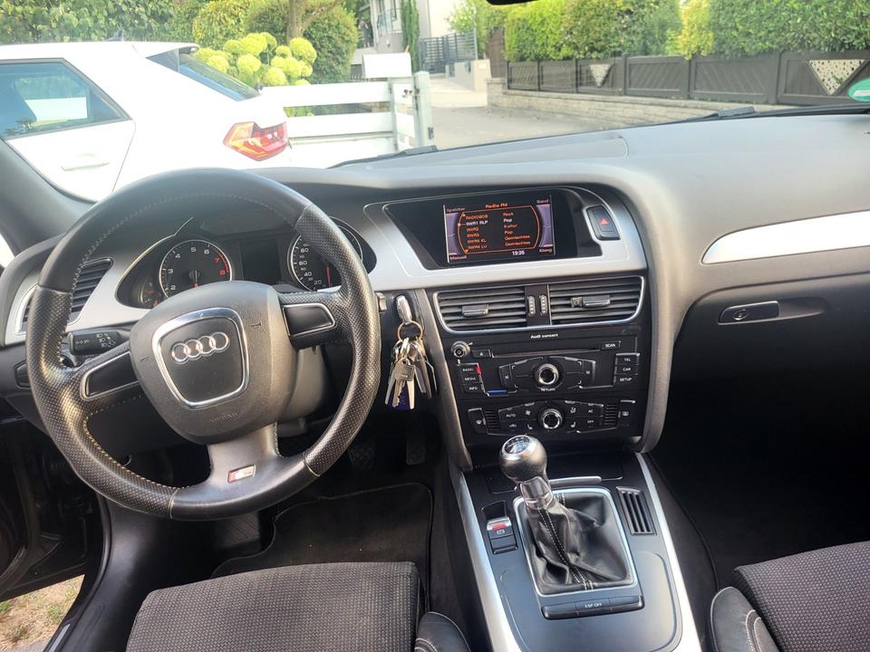 Audi A4 2009 — photo 7