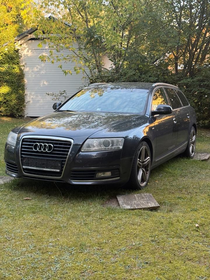 Audi A6 2010 — салон