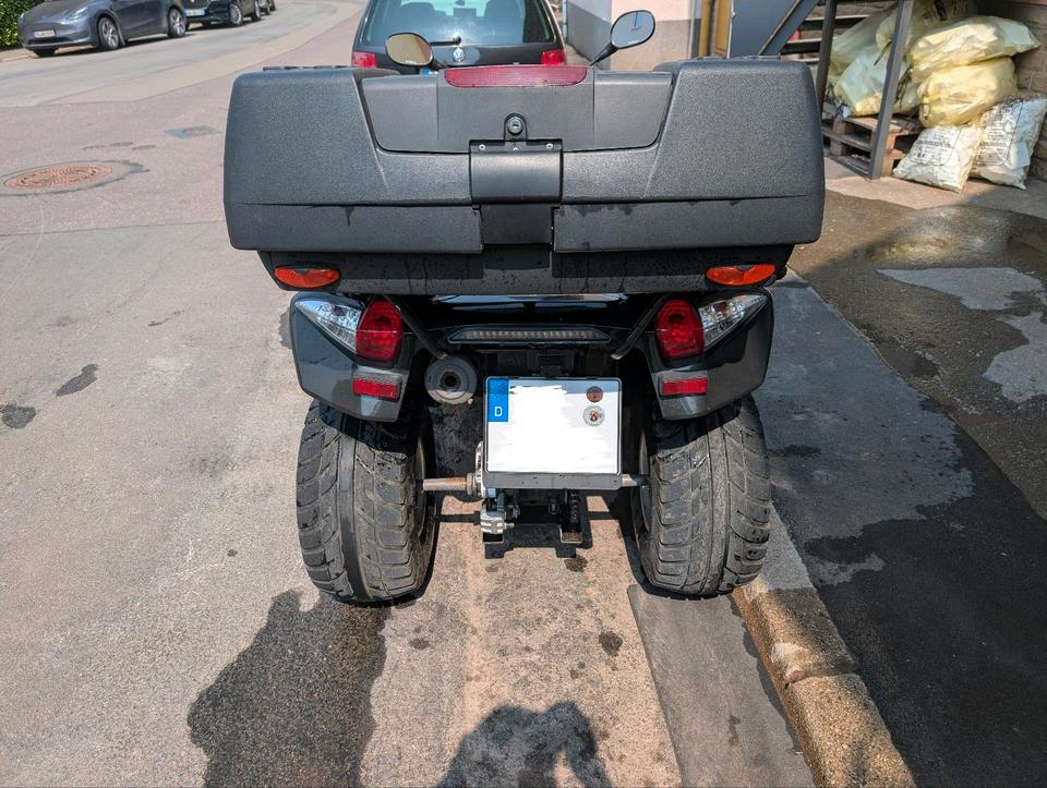 Kymco Verkauft wird ein Kymco mxu 250 Automatik Quad 2012 — rear view