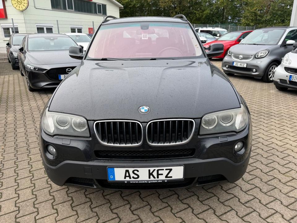 BMW X3 2010 — rear view