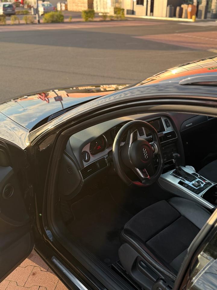Audi A6 2010 — photo 11
