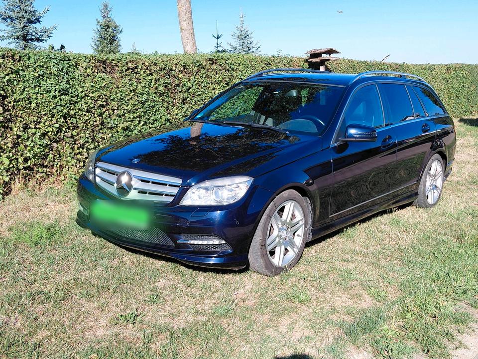 Mercedes Benz C 200 2010 — вигляд ззаду