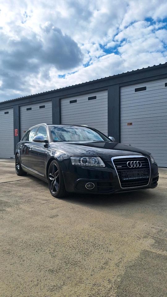 Audi A6 2009 — вигляд ззаду